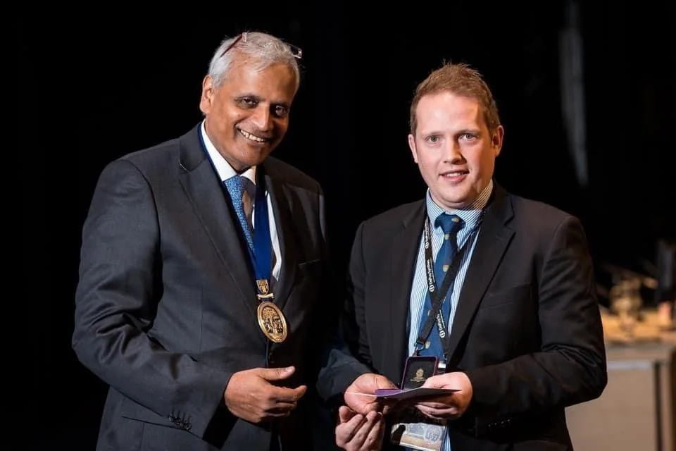 Prof Mason receiving an award